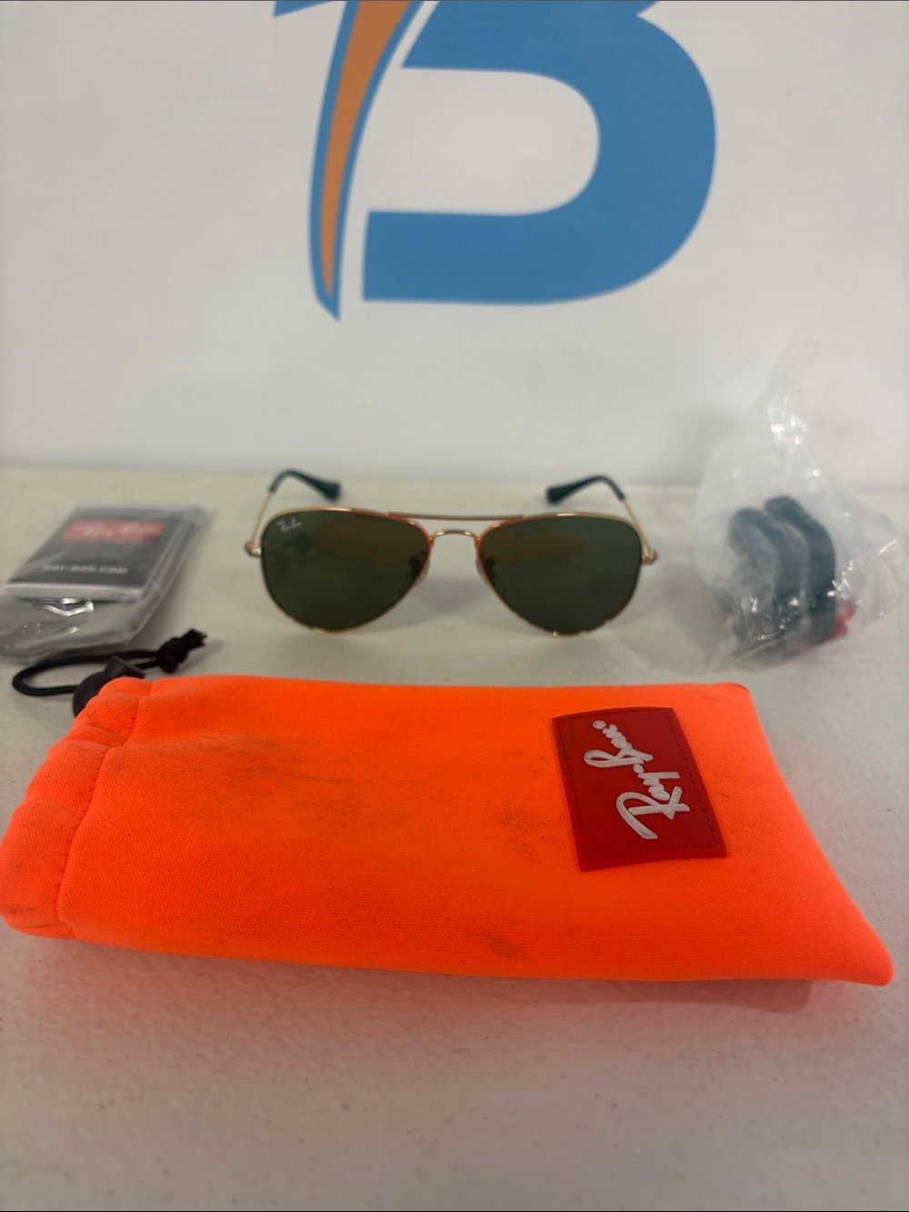 Ray-Ban Gold Frame Sunglasses with Green Lenses and Orange Pouch